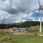 Wind turbines and power station at Ngong Hills, Kenya. The US decision to withdraw from JETP model of climate financing sends a dangerous message to the world that the country is no longer willing to uphold its commitments to a liveable planet, says Savio Carvalho. Copyright: Singularity Preparation (CC BY-SA 4.0)