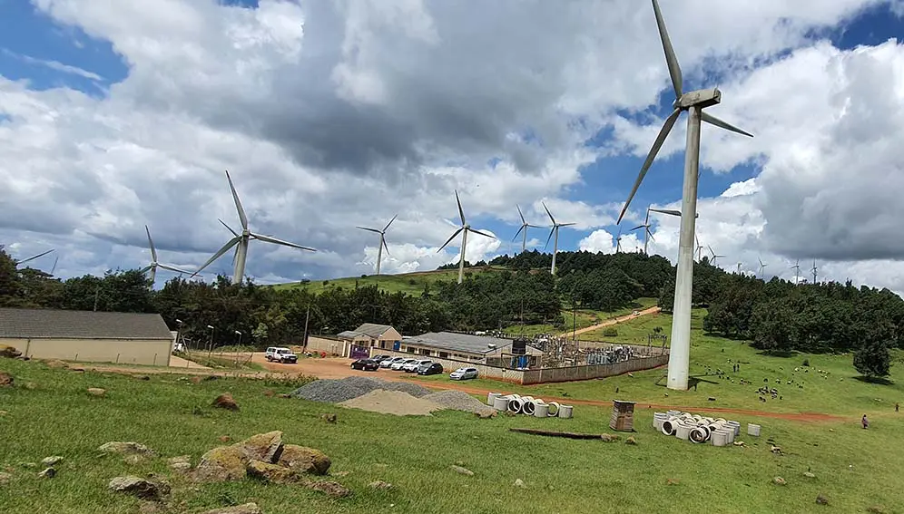 Wind turbines and power station at Ngong Hills, Kenya. The US decision to withdraw from JETP model of climate financing sends a dangerous message to the world that the country is no longer willing to uphold its commitments to a liveable planet, says Savio Carvalho. Copyright: Singularity Preparation (CC BY-SA 4.0)
