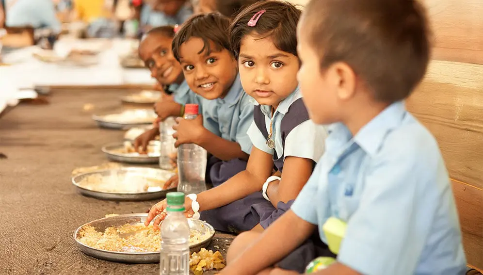 Children having lunch provided by the NGO Akshaya Patra Foundation in India. It is a difficult time for the international response to food insecurity and poor nutrition says David Nabarro, the UN special representative on food and nutrition. Copyright: Image by AkshayaPatra Foundation from Pixabay